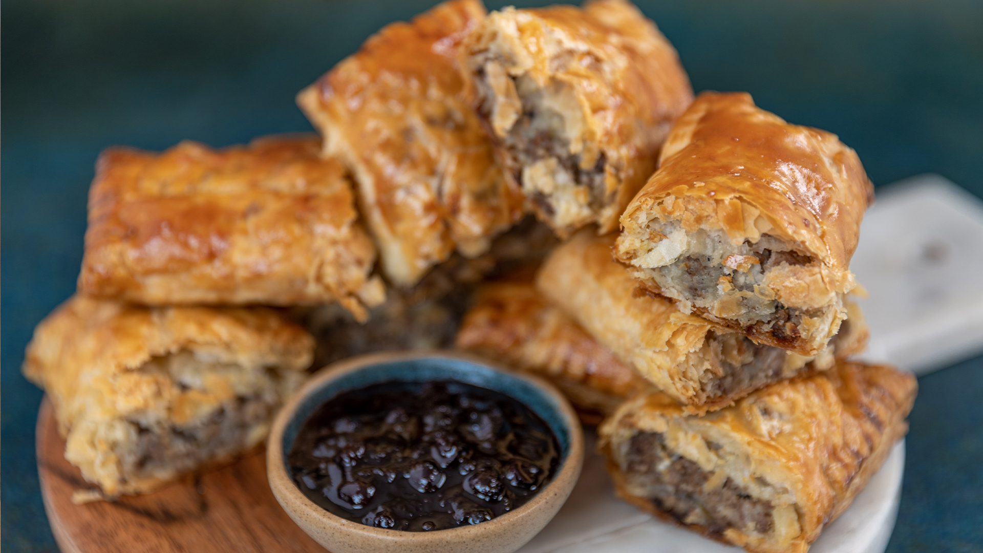 Tourtiere hand pies with homemade berry steak sauce