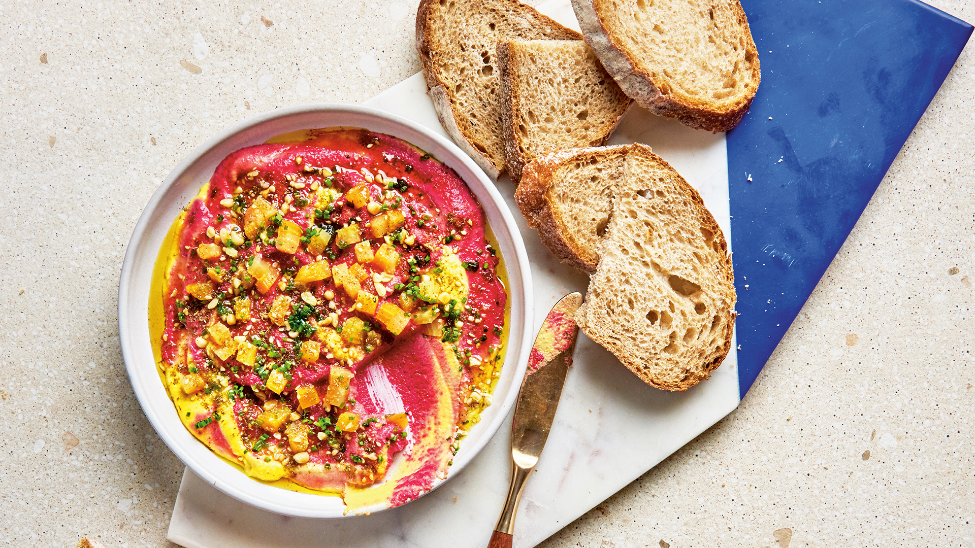 Pink and gold beet dip with pine nuts