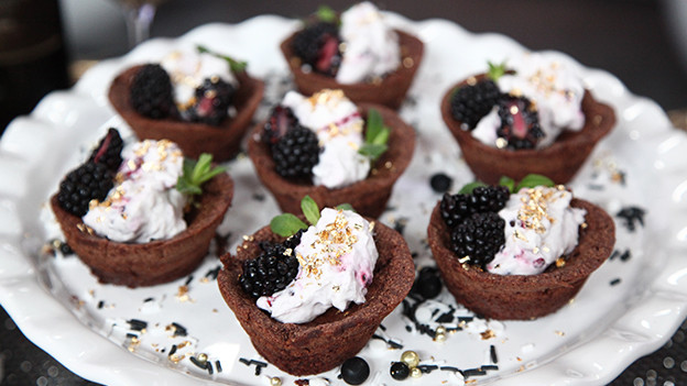 Mini chocolate fudge cakes with blackberry cream
