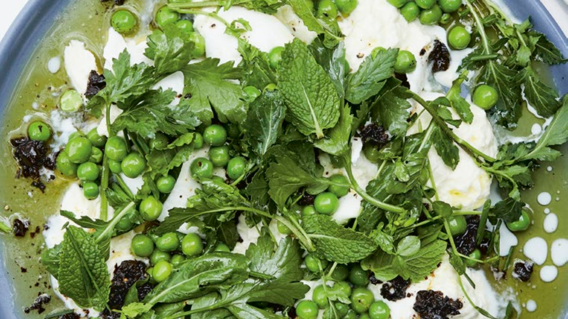 Crushed peas with burrata and black olives
